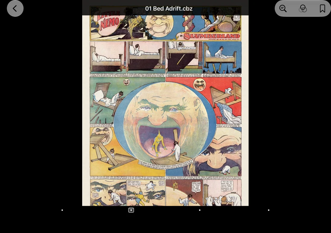 ComicReader displaying a Little Nemo page across the open iPhone Duo screen